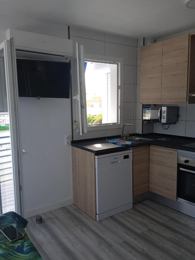 Vora Port Apartment L'Ampolla Bagian luar foto