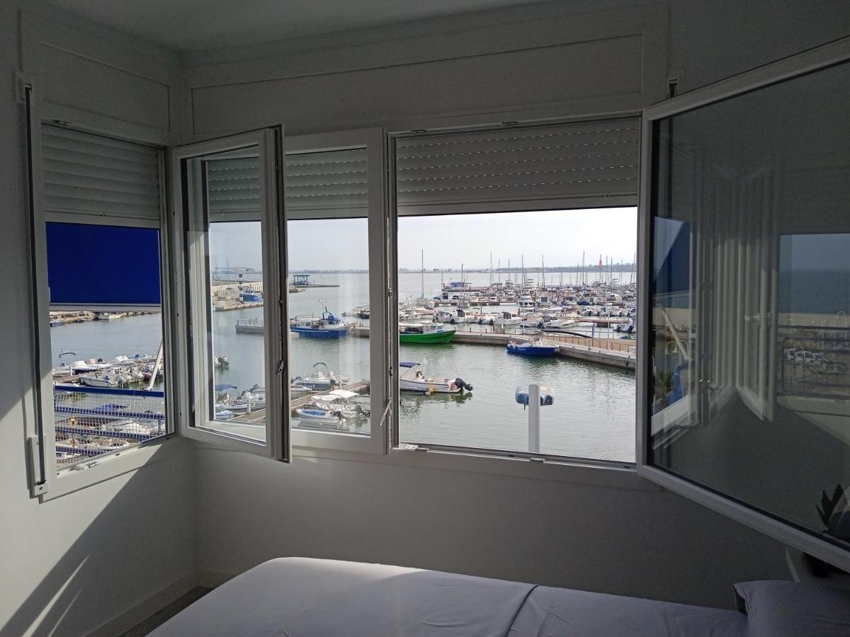 Vora Port Apartment L'Ampolla Bagian luar foto
